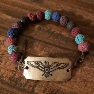 Gold tone Thunderbird medallion beaded multicolored bracelet